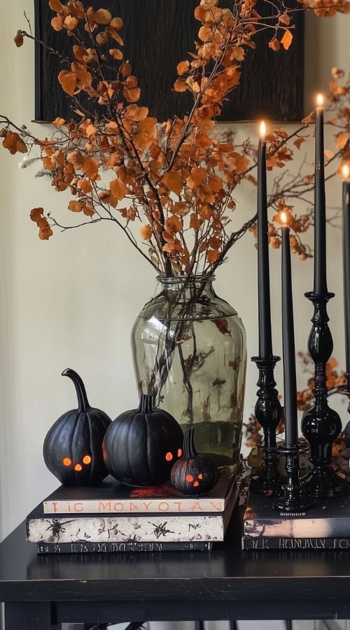 Halloween table scape with pumpkins and Autumn stems