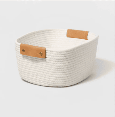 a white basket with brown handles - brr basket ideas - pick basket 1