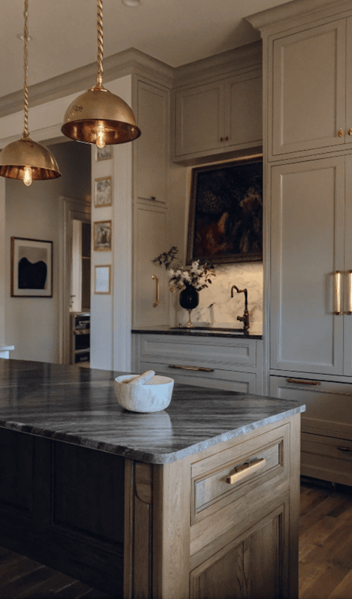 beautiful dark academia kitchen in apothecary kitchen style with marble kitchen island