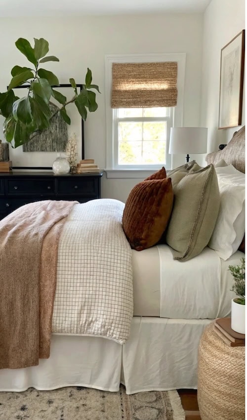 warm bedroom with layers of bedding