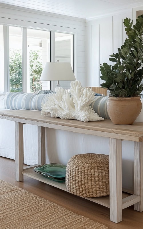 beach decor on console table in coastal granddaughter cottage